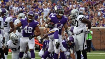 Aug 8, 2014; Minneapolis, MN, USA; Minnesota Vikings running back Matt Asiata (44) celebrates his touchdown during the first quarter against the Oakland Raiders at TCF Bank Stadium. Mandatory Credit: Brace Hemmelgarn-USA TODAY Sports