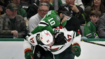 Dallas Stars center Ty Dellandrea ties up Minnesota Wild left wing Kirill Kaprizov during Game 5 in a a first-round playoff series.(Jerome Miron-USA TODAY Sports)