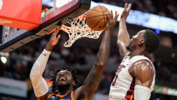 May 6, 2023; Miami, Florida, USA; Miami Heat center Bam Adebayo (13) blocks New York Knicks forward Julius Randle (30) during the first quarter of game three of the 2023 NBA playoffs at Kaseya Center. Mandatory Credit: Rich Storry-USA TODAY Sports