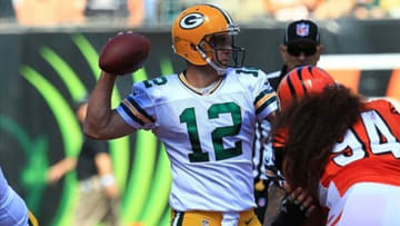 Sep 22, 2013; Cincinnati, OH, USA; Green Bay Packers quarterback Aaron Rodgers (12) passes the ball against the Cincinnati Bengals at Paul Brown Stadium. Mandatory Credit: Pat Lovell-USA TODAY Sports