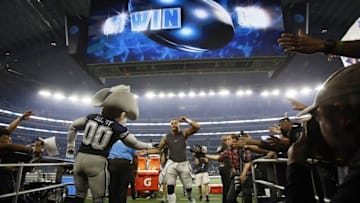 Nov 24, 2016; Arlington, TX, USA; Dallas Cowboys quarterback Dak Prescott (4) runs off the field after the game against the Washington Redskins at AT&T Stadium. Dallas won 31-26. Mandatory Credit: Tim Heitman-USA TODAY Sports