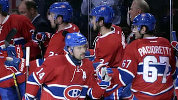 Mar 22, 2016; Montreal, Quebec, CAN; (Editors note: Caption correction) Montreal Canadiens forward Tomas Plekanec (14) celebrates with teammate Max Pacioretty (67) after a goal by Torrey Mitchell (not pictured) against the Anaheim Ducks during the first period at the Bell Centre. Mandatory Credit: Eric Bolte-USA TODAY Sports