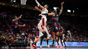 Portland Trail Blazers guard Damian Lillard (0) drives to the basket against Detroit Pistons forward Saddiq Bey (41) Credit: Troy Wayrynen-USA TODAY Sports