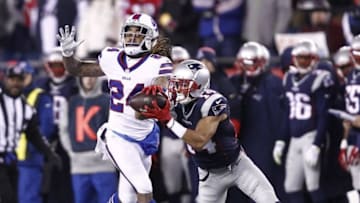 Nov 23, 2015; Foxborough, MA, USA; New England Patriots wide receiver Chris Harper (14) catches a pass against Buffalo Bills cornerback Stephon Gilmore (24) during the second half at Gillette Stadium. Mandatory Credit: Mark L. Baer-USA TODAY Sports