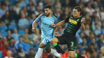 MANCHESTER, ENGLAND - SEPTEMBER 14: Andreas Christensen of Borussia Moenchengladbach challenges Sergio Aguero of Manchester City for the ball during the UEFA Champions League match between Manchester City FC and VfL Borussia Moenchengladbach at Etihad Stadium on September 14, 2016 in Manchester, England. (Photo by Richard Heathcote/Getty Images)