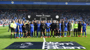 LEICESTER, ENGLAND - MARCH 30: The Leicester City and Bournemouth players stand with the match officials in protest against racism prior to the Premier League match between Leicester City and AFC Bournemouth at The King Power Stadium on March 30, 2019 in Leicester, United Kingdom. (Photo by Michael Regan/Getty Images)