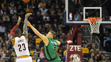 Mar 5, 2016; Cleveland, OH, USA; Cleveland Cavaliers forward LeBron James (23) shoots over Boston Celtics forward Jonas Jerebko (8) during the third quarter at Quicken Loans Arena. The Cavs won 120-103. Mandatory Credit: Ken Blaze-USA TODAY Sports