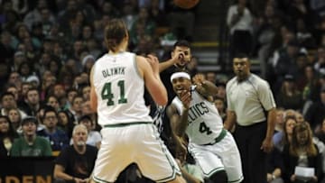 Dec 21, 2015; Boston, MA, USA; Boston Celtics guard Isaiah Thomas (4) pass the ball to center Kelly Olynyk (41) during the first half against the Minnesota Timberwolves at TD Garden. Mandatory Credit: Bob DeChiara-USA TODAY Sports