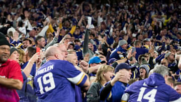 MINNEAPOLIS, MN - JANUARY 14: Fans react after Stefon Diggs #14 of the Minnesota Vikings scored a 61 yard touchdown at the end of the fourth quarter of the NFC Divisional Playoff game against the New Orleans Saints on January 14, 2018 at U.S. Bank Stadium in Minneapolis, Minnesota. The Vikings defeated the Saints 29-24. (Photo by Stephen Maturen/Getty Images)