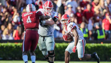 Oct 9, 2016; Columbia, SC, USA; Georgia Bulldogs running back Brian Herrien (35) follows a block by Bulldogs guard Greg Pyke (73) during the second half against the South Carolina Gamecocks at Williams-Brice Stadium. Georgia won 28-14. Mandatory Credit: Jim Dedmon-USA TODAY Sports
