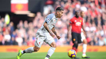 MANCHESTER, ENGLAND - FEBRUARY 24: Roberto Firmino of Liverpool runs with the ball during the Premier League match between Manchester United and Liverpool FC at Old Trafford on February 24, 2019 in Manchester, United Kingdom. (Photo by Laurence Griffiths/Getty Images)