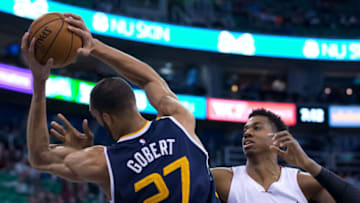 Utah Jazz center Rudy Gobert (27) grabs a rebound over Miami Heat center Hassan Whiteside (21)(Russ Isabella-USA TODAY Sports)