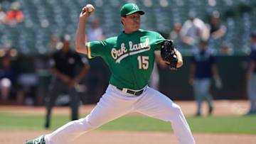 OAKLAND, CA - JULY 17: Homer Bailey #15 of the Oakland Athletics pitches against the Seattle Mariners in the top of the first inning at Ring Central Coliseum on July 17, 2019 in Oakland, California. (Photo by Thearon W. Henderson/Getty Images)