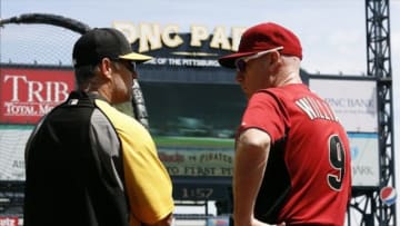 Aug 17, 2013; Pittsburgh, PA, USA; Pittsburgh Pirates hitting coach Jay Bell (left) and Arizona Diamondbacks third base coach Matt Williams (right) talk at the batting cage before playing at PNC Park. The Arizona Diamondbacks won 15-5. Mandatory Credit: Charles LeClaire-USA TODAY Sports