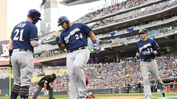 MINNEAPOLIS, MN - MAY 18: Milwaukee Brewers First base Jesus Aguilar (24) celebrates his 1st home run of the game with Milwaukee Brewers Third base Travis Shaw (21) during a MLB game between the Minnesota Twins and Milwaukee Brewers on May 18, 2018 at Target Field in Minneapolis, MN. The Brewers defeated the Twins 8-3.(Photo by Nick Wosika/Icon Sportswire via Getty Images)
