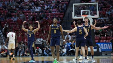 Mar 18, 2022; San Diego, CA, USA; Notre Dame Fighting Irish guard Blake Wesley (0) and guard Prentiss Hubb (3) and guard Cormac Ryan (5) and forward Nate Laszewski (14) react in the second half against the Alabama Crimson Tide during the first round of the 2022 NCAA Tournament at Viejas Arena. Mandatory Credit: Orlando Ramirez-USA TODAY Sports