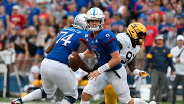 LAWRENCE, KANSAS - SEPTEMBER 21: Quarterback Carter Stanley #9 of the Kansas Jayhawks looks to pass against the West Virginia Mountaineers in the third quarter at Memorial Stadium on September 21, 2019 in Lawrence, Kansas. (Photo by Ed Zurga/Getty Images)