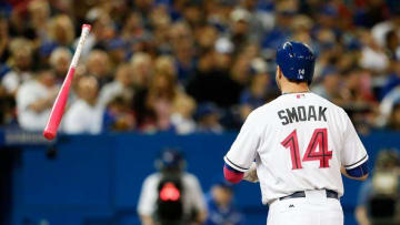 May 8, 2016; Toronto, Ontario, CAN; Toronto Blue Jays first baseman Justin Smoak (14) throws his bat during MLB game action against the Los Angeles at Rogers Centre. Mandatory Credit: Kevin Sousa-USA TODAY Sports