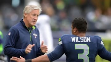 Nov 2, 2014; Seattle, WA, USA; Seattle Seahawks coach Pete Carroll (left) and quarterback Russell Wilson (3) before the game against the Oakland Raiders at CenturyLink Field. Mandatory Credit: Kirby Lee-USA TODAY Sports