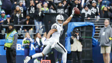 Nov 27, 2022; Seattle, Washington, USA; Las Vegas Raiders wide receiver Mack Hollins (10) scores a touchdown on a reception against the Seattle Seahawks during the second quarter at Lumen Field. Mandatory Credit: Joe Nicholson-USA TODAY Sports