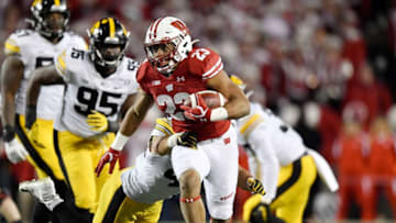 MADISON, WISCONSIN - NOVEMBER 09: Jonathan Taylor #23 of the Wisconsin Badgers runs with the football in the second half against the Iowa Hawkeyes at Camp Randall Stadium on November 09, 2019 in Madison, Wisconsin. (Photo by Quinn Harris/Getty Images)
