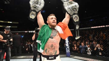 NEW YORK, NY - NOVEMBER 12: UFC lightweight and featherweight champion Conor McGregor of Ireland celebrates after defeating Eddie Alvarez in their UFC lightweight championship fight during the UFC 205 event at Madison Square Garden on November 12, 2016 in New York City. (Photo by Jeff Bottari/Zuffa LLC/Zuffa LLC via Getty Images)
