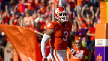 Oct 4, 2014; Clemson, SC, USA; Clemson Tigers defensive end Vic Beasley (3) recovers a fumble and scores a touchdown during the third quarter against the North Carolina State Wolfpack at Clemson Memorial Stadium. Mandatory Credit: Joshua S. Kelly-USA TODAY Sports