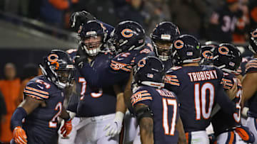 CHICAGO, IL - DECEMBER 09: Bradley Sowell #79 of the Chicago Bears (L) celebrates with teammates after scoring his first NFL touchdown against the Losangeles Rams at Soldier Field on December 9, 2018 in Chicago, Illinois. (Photo by Jonathan Daniel/Getty Images)