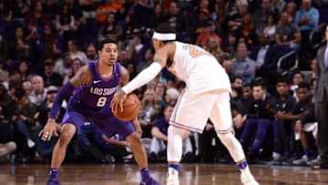 PHOENIX, AZ - JANUARY 26: Trey Burke #23 of the New York Knicks handles the ball against Tyler Ulis #8 of the Phoenix Suns on January 26, 2018 at Talking Stick Resort Arena in Phoenix, Arizona. NOTE TO USER: User expressly acknowledges and agrees that, by downloading and or using this photograph, user is consenting to the terms and conditions of the Getty Images License Agreement. Mandatory Copyright Notice: Copyright 2018 NBAE (Photo by Michael Gonzales/NBAE via Getty Images)