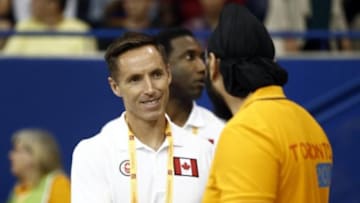 Jul 23, 2015; Toronto, Ontario, CAN; Former professional basketball player Steve Nash greets volunteers during a men
