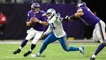 MINNEAPOLIS, MN - OCTOBER 1: Case Keenum #7 of the Minnesota Vikings drops back to pass the ball while pursued by defender Ezekiel Ansah #94 of the Detroit Lions in the second half of the game on October 1, 2017 at U.S. Bank Stadium in Minneapolis, Minnesota. (Photo by Hannah Foslien/Getty Images)