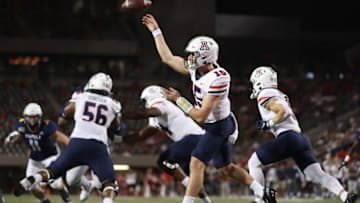 TUCSON, ARIZONA - SEPTEMBER 18: Quarterback Will Plummer #15 of the Arizona Wildcats throws a pass during the first half of the NCCAF game against the Northern Arizona Lumberjacks at Arizona Stadium on September 18, 2021 in Tucson, Arizona. (Photo by Christian Petersen/Getty Images)