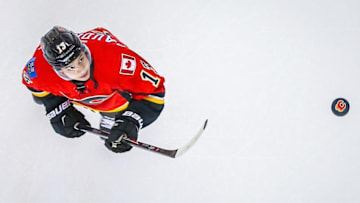 Mar 9, 2016; Calgary, Alberta, CAN; Calgary Flames left wing Johnny Gaudreau (13) controls the puck during the warmup period against the Nashville Predators at Scotiabank Saddledome. Mandatory Credit: Sergei Belski-USA TODAY Sports