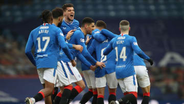 GLASGOW, SCOTLAND - FEBRUARY 13: Ianis Hagi of Rangers is seen as team mate congratulate Ryan Jack of Rangers after scoring their side's first goal during the Ladbrokes Scottish Premiership match between Rangers and Kilmarnock at Ibrox Stadium on February 13, 2021 in Glasgow, Scotland. Sporting stadiums around the UK remain under strict restrictions due to the Coronavirus Pandemic as Government social distancing laws prohibit fans inside venues resulting in games being played behind closed doors. (Photo by Ian MacNicol/Getty Images)