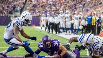 MINNEAPOLIS, MN - DECEMBER 18: Andrew Sendejo #34 of the Minnesota Vikings, Chester Rogers #80 and Dwayne Allen #83 of the Indianapolis Colts scramble for a loose ball after an incomplete pass during the first quarter of the game on December 18, 2016 at US Bank Stadium in Minneapolis, Minnesota. (Photo by Adam Bettcher/Getty Images)