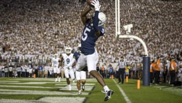STATE COLLEGE, PA - SEPTEMBER 18: Jahan Dotson #5 of the Penn State Nittany Lions catches a pass for a touchdown against the Auburn Tigers during the first half at Beaver Stadium on September 18, 2021 in State College, Pennsylvania. (Photo by Scott Taetsch/Getty Images)