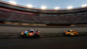 BRISTOL, TN - AUGUST 19: Kyle Busch, driver of the #18 M&M's Caramel Toyota, races during the Monster Energy NASCAR Cup Series Bass Pro Shops NRA Night Race at Bristol Motor Speedway on August 19, 2017 in Bristol, Tennessee. (Photo by Brian Lawdermilk/Getty Images)