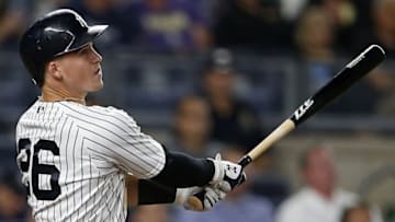 Sep 27, 2016; Bronx, NY, USA; New York Yankees first baseman Tyler Austin (26) hits a two-run home run during the seventh inning against the Boston Red Sox at Yankee Stadium. Mandatory Credit: Adam Hunger-USA TODAY Sports