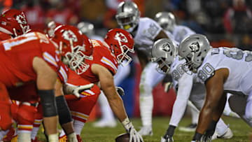 KANSAS CITY, MO - DECEMBER 08: Center Mitch Morse #61 of the Kansas City Chiefs gets set to snap the ball against the Oakland Raiders during the second half on December 8, 2016 at Arrowhead Stadium in Kansas City, Missouri. (Photo by Peter G. Aiken/Getty Images)