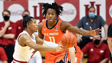 Feb 2, 2021; Bloomington, Indiana, USA; Indiana Hoosiers guard Armaan Franklin (L) passes the ball while defended by Illinois Fighting Illini guard Ayo Dosunmu (11) during the second half at Simon Skjodt Assembly Hall. Mandatory Credit: Marc Lebryk-USA TODAY Sports