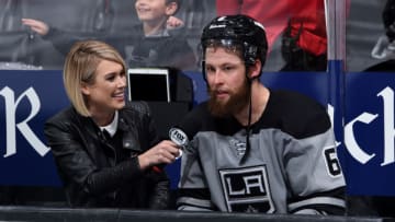 LOS ANGELES, CA - JANUARY 12: Fox Sports West reporter Carrlyn Bathe interviews Jake Muzzin #6 of the Los Angeles Kings after he defeated the Pittsburgh Penguins 5-2 in the game at STAPLES Center on January 12, 2019 in Los Angeles, California. (Photo by Adam Pantozzi/NHLI via Getty Images)