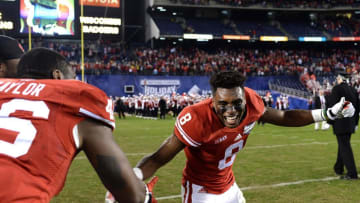 Dec 30, 2015; San Diego, CA, USA; Wisconsin Badgers cornerback Sojourn Shelton (8) is congratulated by tight end Austin Traylor (46) after a game changing interception in a 23-21 win over the USC Trojans in the 2015 Holiday Bowl at Qualcomm Stadium. Mandatory Credit: Jake Roth-USA TODAY Sports