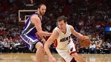 Nov 1, 2016; Miami, FL, USA; Miami Heat guard Goran Dragic (7) dribbles the ball around Sacramento Kings center Kosta Koufos (41) during the second half at American Airlines Arena. The Miami Heat defeat the Sacramento Kings 108-96 in overtime. Mandatory Credit: Jasen Vinlove-USA TODAY Sports