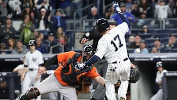Oct 1, 2016; Bronx, NY, USA; New York Yankees third baseman Ronald Torreyes (17) scores a run past Baltimore Orioles catcher Matt Wieters (32) during the eighth inning at Yankee Stadium. New York Yankees won 7-3. Mandatory Credit: Anthony Gruppuso-USA TODAY Sports