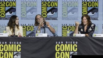 SAN DIEGO, CALIFORNIA - JULY 22: (L-R) Angela Kang, Greg Nicotero, and Norman Reedus speak onstage at AMC's "The Walking Dead" panel during 2022 Comic-Con International: San Diego at San Diego Convention Center on July 22, 2022 in San Diego, California. (Photo by Kevin Winter/Getty Images)