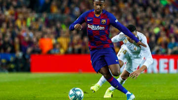 BARCELONA, SPAIN - DECEMBER 18: (BILD ZEITUNG OUT) Nelson Semedo of FC Barcelona and Carlos Henrique Casemiro of Real Madrid battle for the ball during the Liga match between FC Barcelona and Real Madrid CF at Camp Nou on December 18, 2019 in Barcelona, Spain. (Photo by TF-Images/Getty Images)