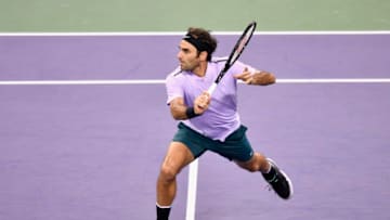 SHANGHAI, CHINA - OCTOBER 15: Roger Federer of Switzerland returns a shot to Rafael Nadal of Spain during the Men's Single Final on Day 8 of the 2017 ATP 1000 Shanghai Rolex Masters on October 15, 2017 at Qizhong Stadium in Shanghai, China. (Photo by Kevin Lee/Getty Images)