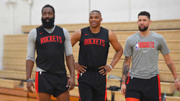 OKC Thunder Team Previews: James Harden #13, Russell Westbrook, and Austin Rivers #25 of the Houston Rockets(Photo by Bill Baptist/NBAE via Getty Images)