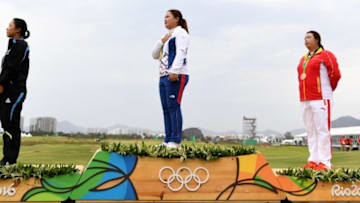 Aug 20, 2016; Rio de Janeiro, Brazil; Silver medalist Lydia Ko (NZL), left, gold medalist Inbee Park (KOR), and bronze medalist Shanshan Feng (CHN) take the podium after competing in the final round of women's golf during the Rio 2016 Summer Olympic Games at Olympic Golf Course. Mandatory Credit: Michael Madrid-USA TODAY Sports