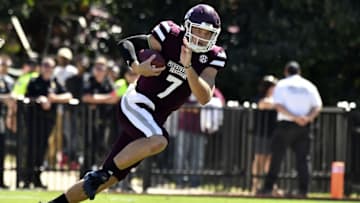 Oct 8, 2016; Starkville, MS, USA; Mississippi State Bulldogs quarterback Nick Fitzgerald (7) runs the ball during the third quarter of the game against the Auburn Tigers at Davis Wade Stadium. Auburn won 38-14. Mandatory Credit: Matt Bush-USA TODAY Sports